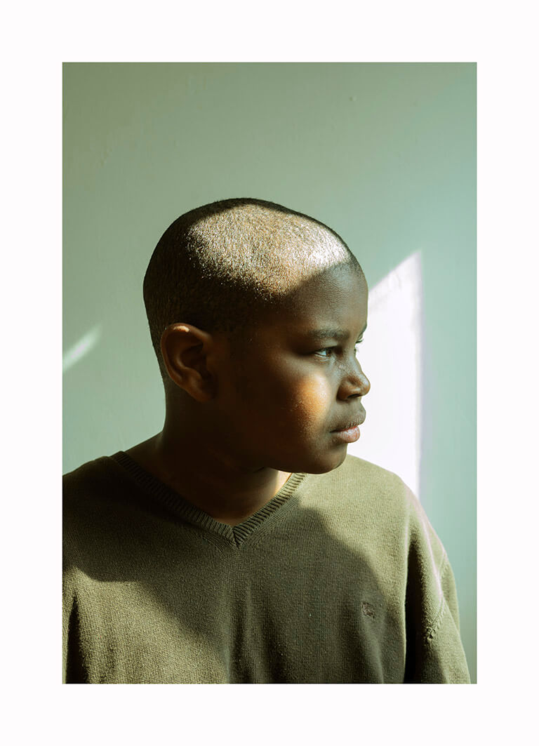 Kofo Olayanju - What Will Become of Us. Portrait of young black man looking out of frame